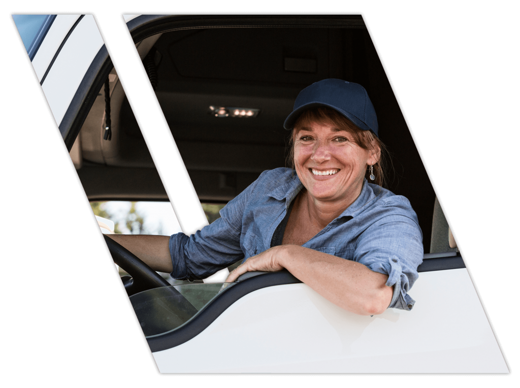 Female truck driver in driver's seat