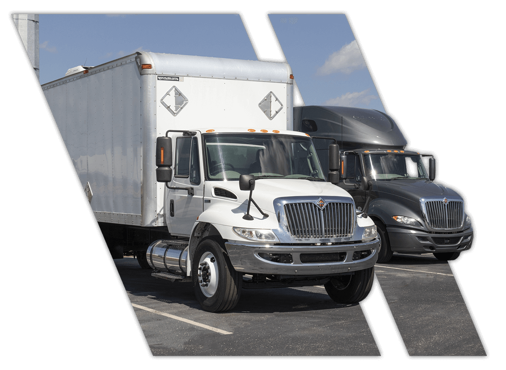 Two trucks parked together in Monroe LA