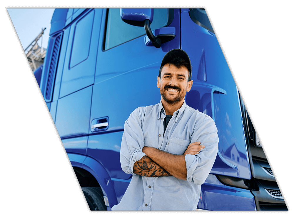 Smiling truck driver during company CDL training in Mississippi